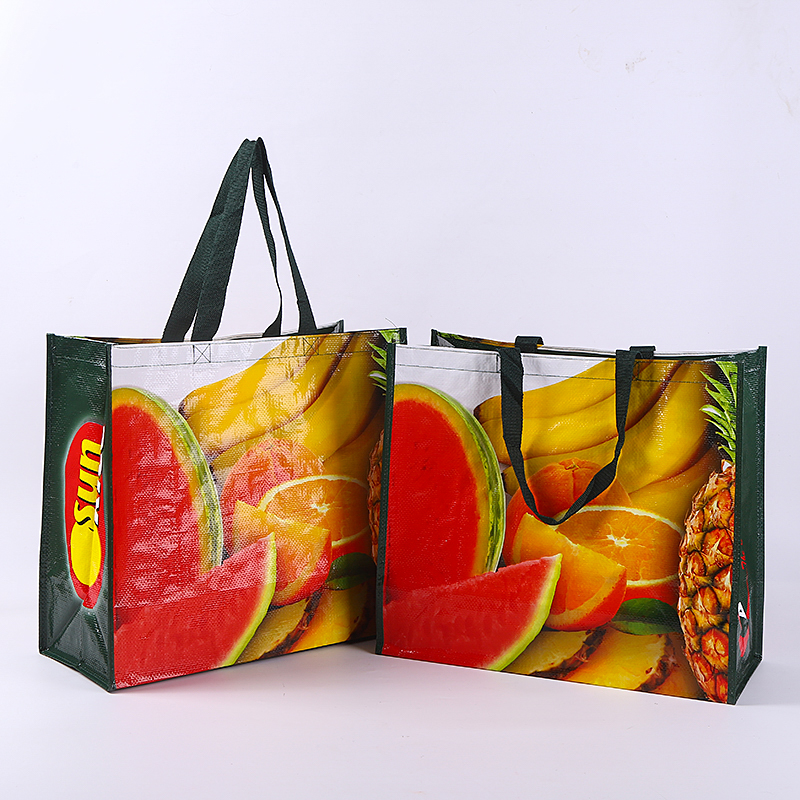 Reusable PP woven bags with fruit print design, durable and colorful