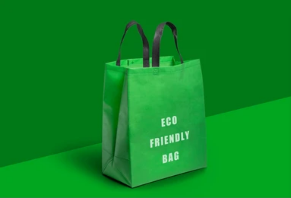 Green eco-friendly reusable bag with black handles