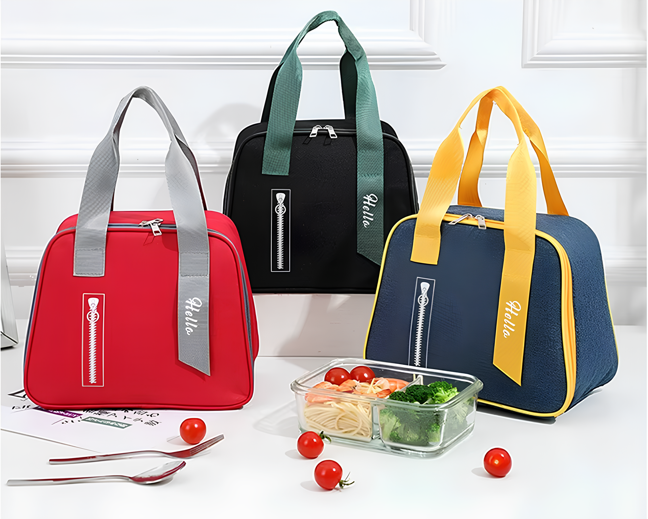 Colorful insulated lunch bags with food container, on table