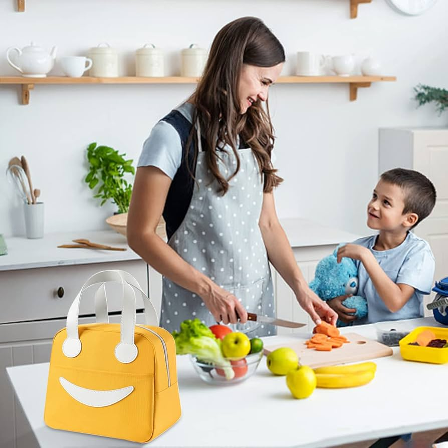 Mother and child in kitchen with yellow insulated lunch bag