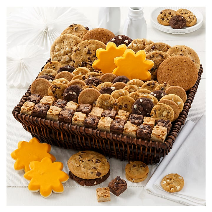 Assorted cookies and brownies in a decorative basket