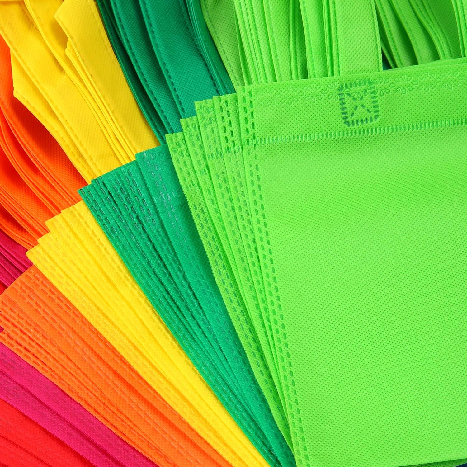 Colorful non-woven shopping bags arranged in a fan pattern