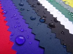 Colorful waterproof fabric samples with water droplets