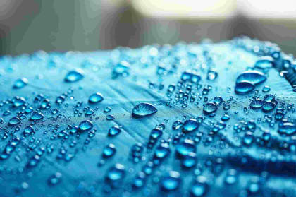 Waterproof blue non-woven fabric with water droplets