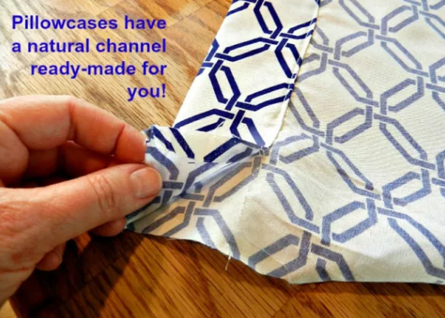 Hand holding a pillowcase with a ready-made channel for crafting purposes