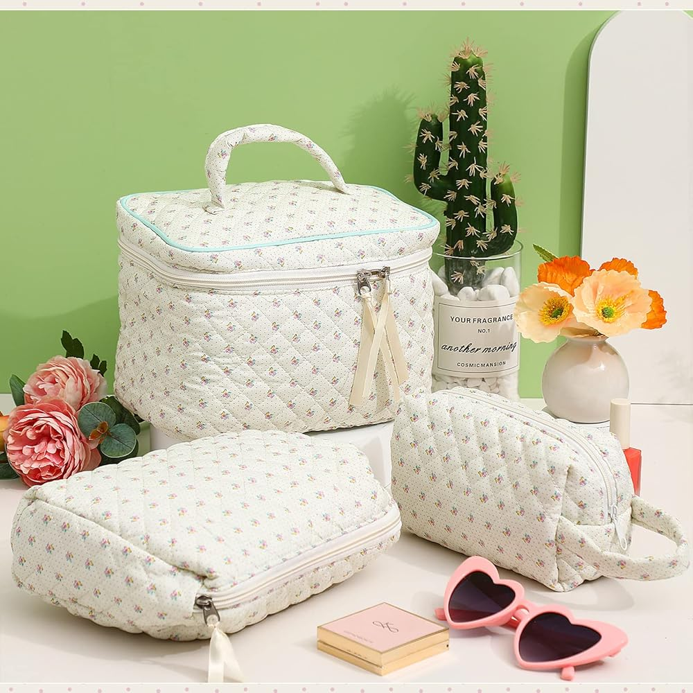 Floral quilted cosmetic bags in various sizes, perfect for travel and storage