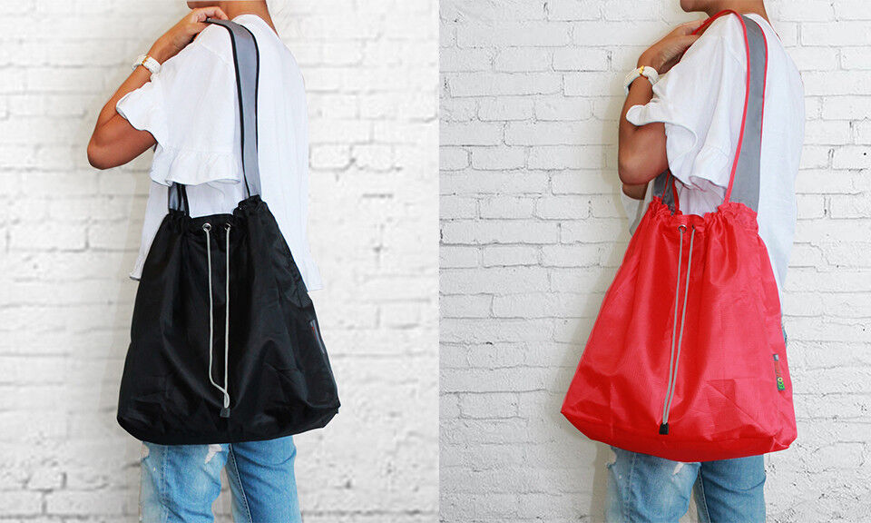 Black and red drawstring reusable bags worn on shoulder