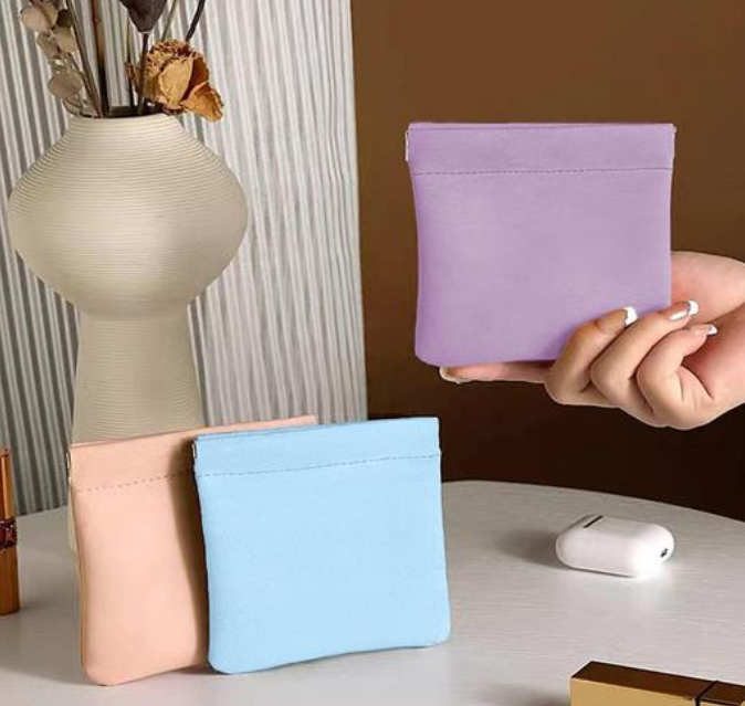 Compact pastel-colored pouches for storage and travel