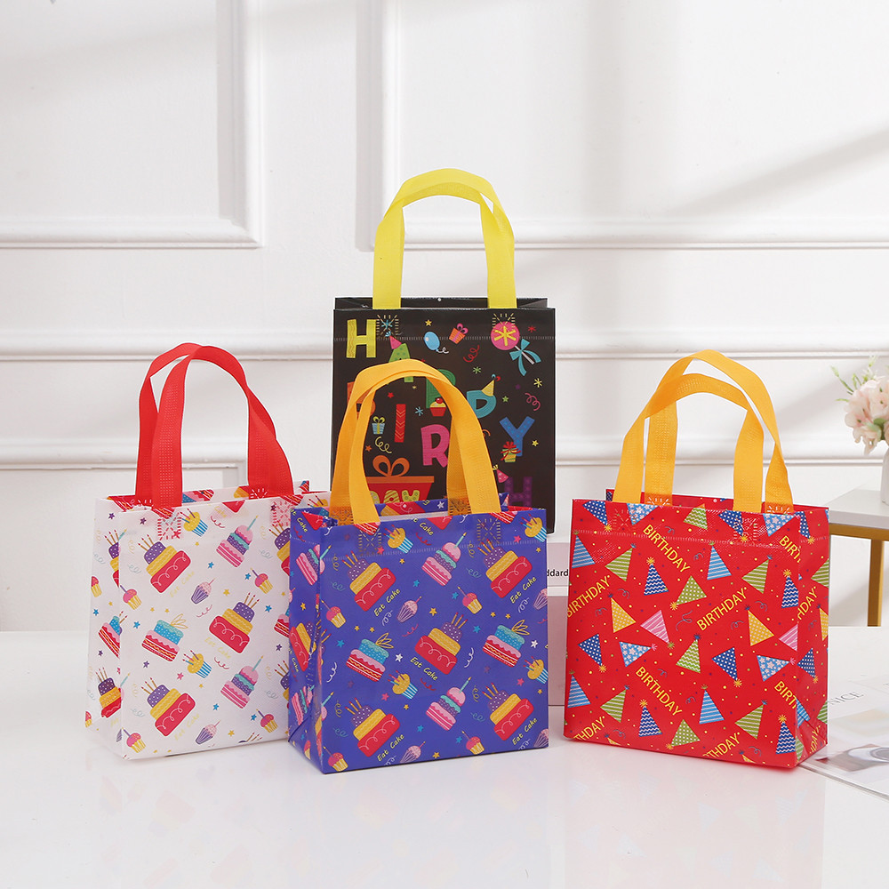 Colorful birthday-themed non-woven gift bags with handles