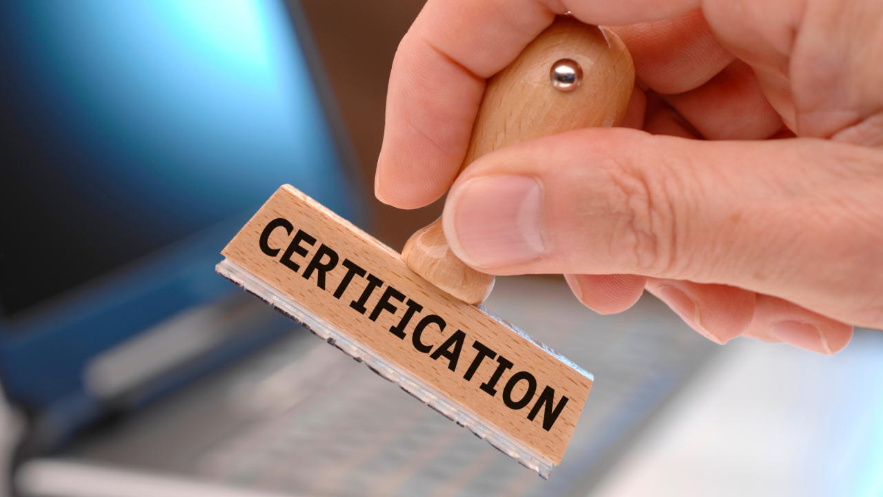 Certification stamp on a wooden block