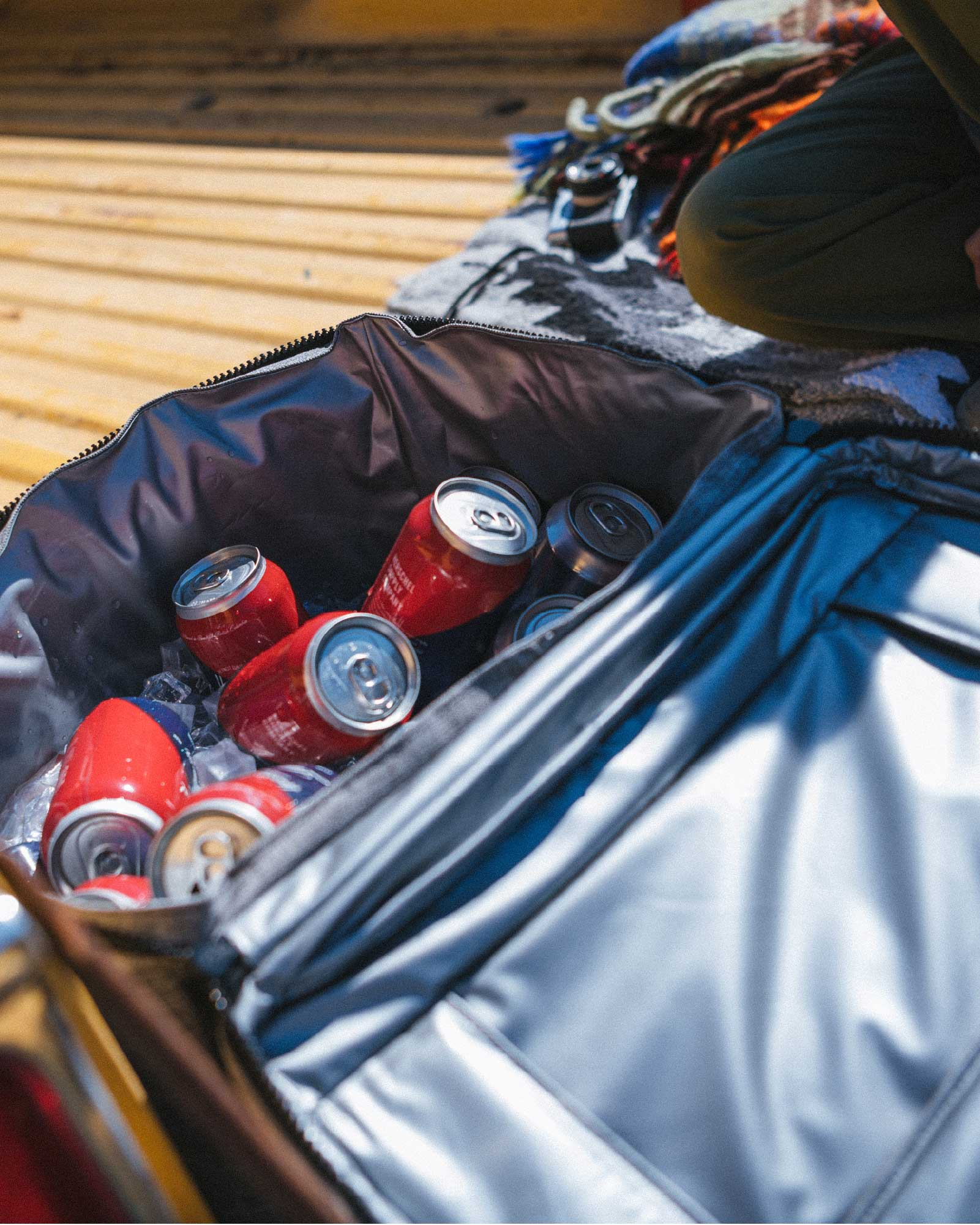 Insulated bag filled with cans and ice