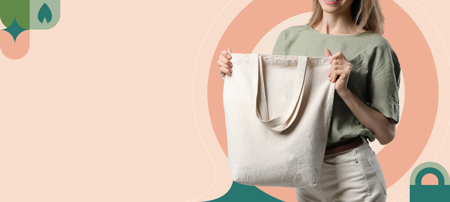 woman holding a non-woven tote bag with soft colors and abstract design