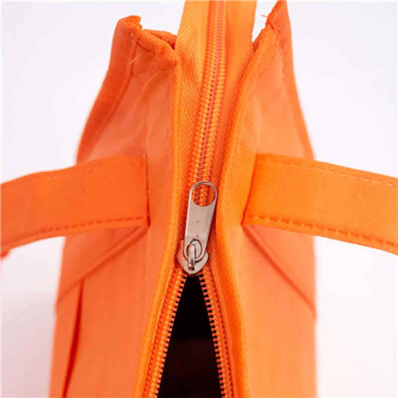 Orange insulated bag with sturdy zipper and reinforced handles