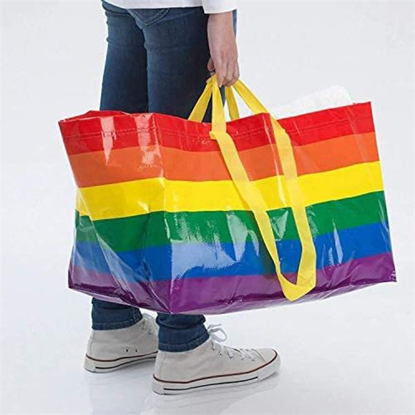 Yellow PP woven festival bag with green and blue handles