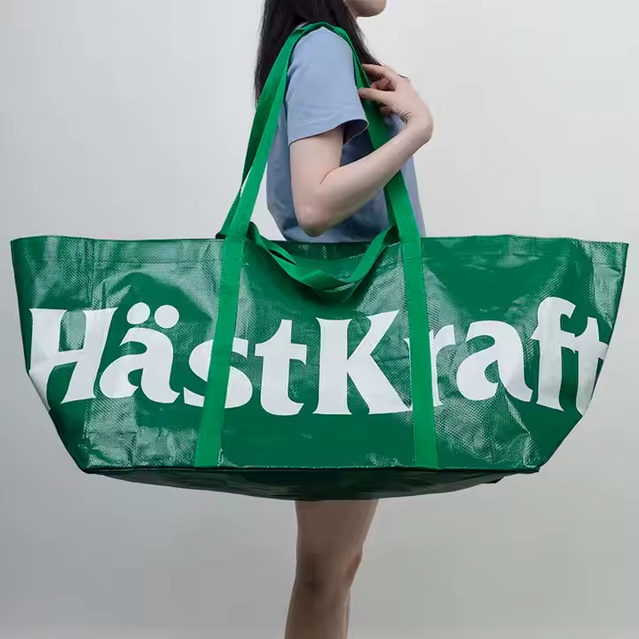 Large green PP woven bag with HästKraft logo
