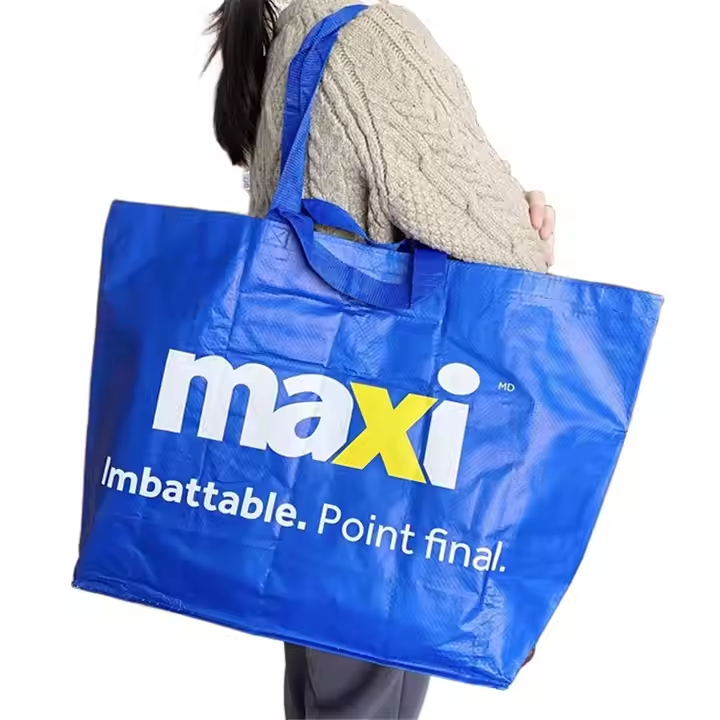 Reusable grocery bag with vegetable-themed print and brown handles