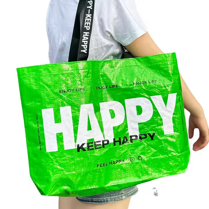 Bright green PP woven bag with bold "HAPPY" print and black straps