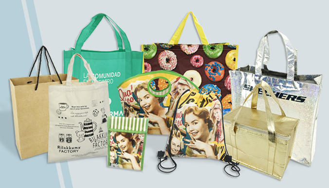 Various custom printed reusable shopping bags in assorted materials