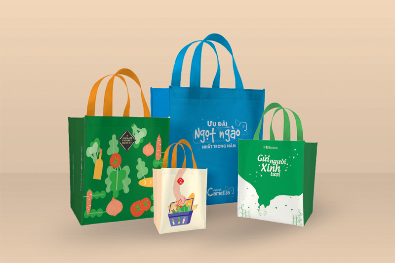 Colorful printed reusable shopping bags in various styles and sizes