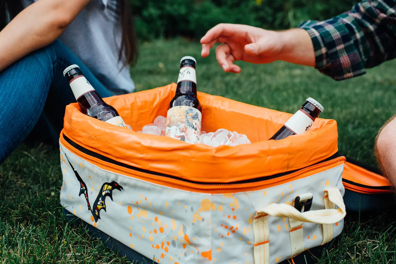 Insulated cooler bag with ice and beer bottles