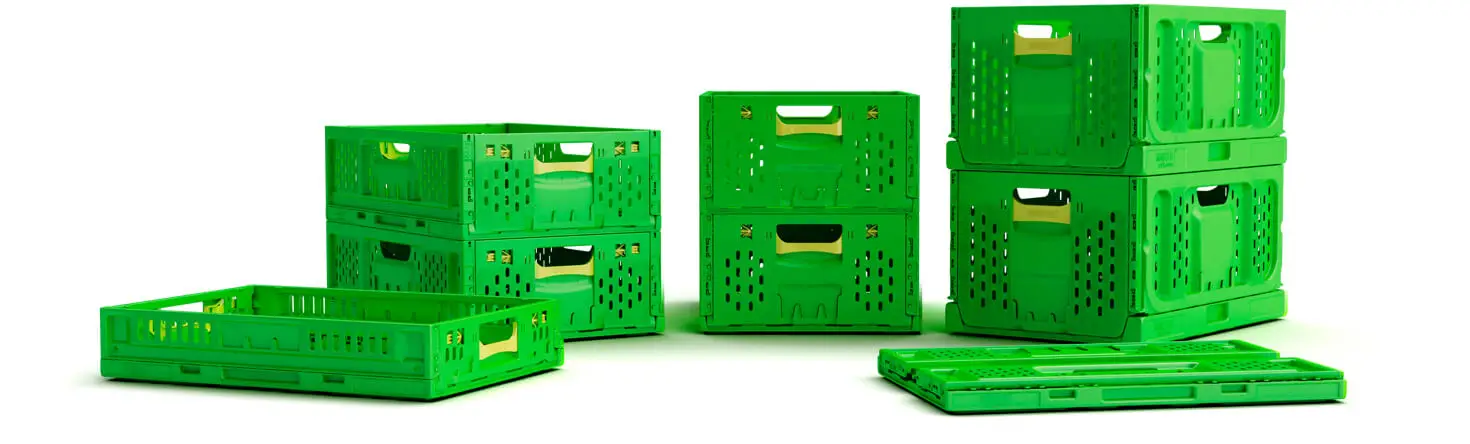 green plastic collapsible storage crates stacked and folded