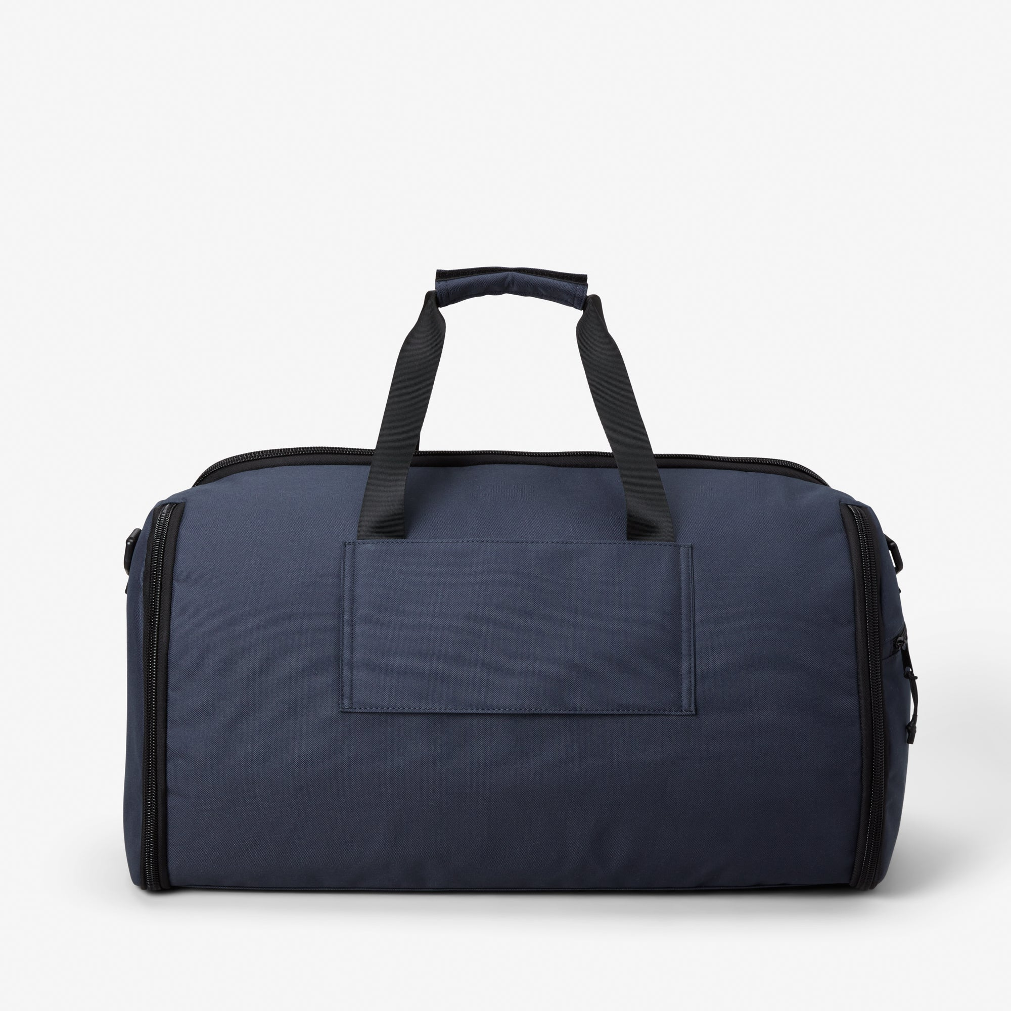 Navy blue duffel bag with black handles on white background