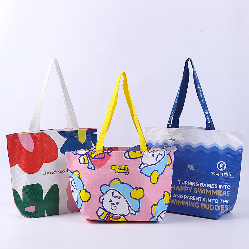 Colorful reusable tote bags with cartoon and graphic designs
