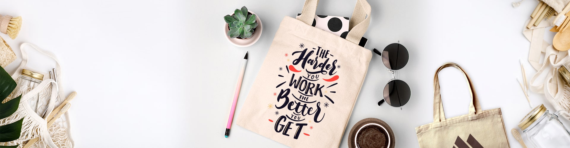 Canvas tote bag with motivational quote and eco-friendly accessories