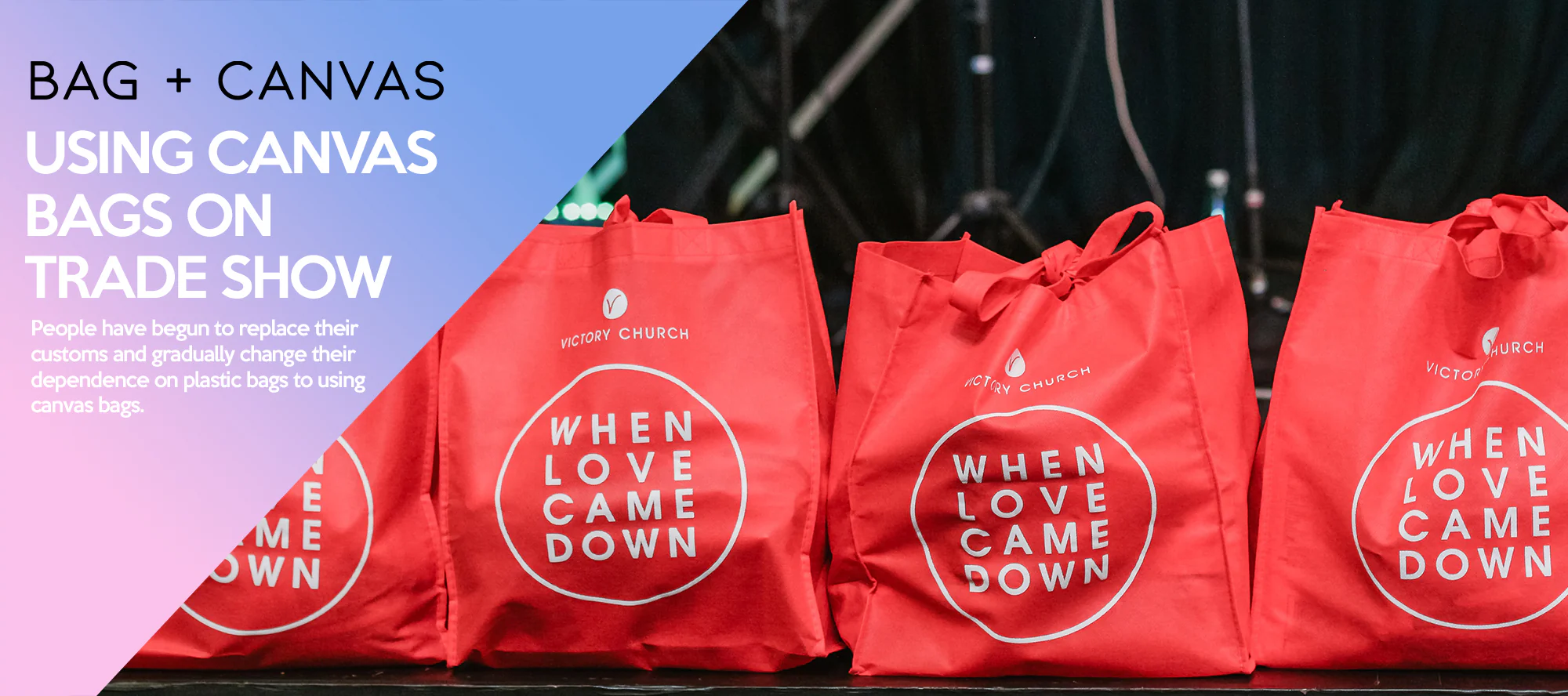 Red canvas bags with "When Love Came Down" print used at trade show