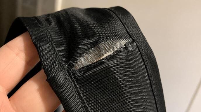 Torn grocery bag at handle
